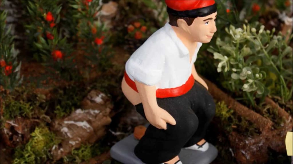 In Spain, people make defecating figurines