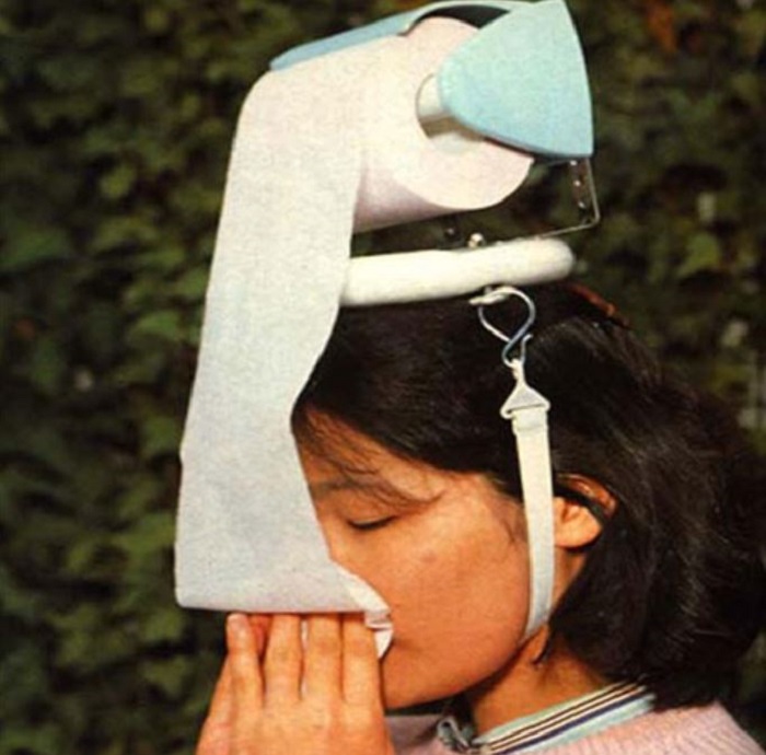 Head Mounted Toilet Paper Dispenser